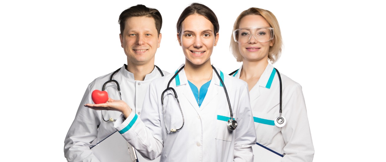 three-smiling-doctors-are-standing-and-one-of-them-is-holding-a-heart-picture-id1217006668 (1)
